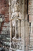 Preah Khan temple - bas-reliefs of threshold guardians.